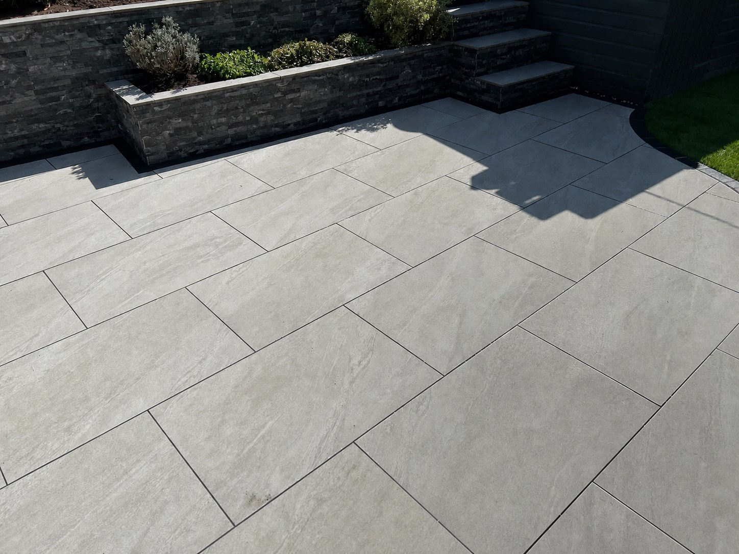 Newly laid grey paved patio